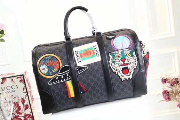Gucci Night Courrier Soft GG Supreme Carry-on Duffle